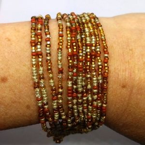 Handmade beaded bracelet coppers,  bronze and gold